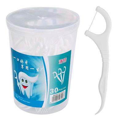 China Custom Logo 30/50 Dental Floss Plastic Dental Floss Picks Box Eco Friendly Oral Stick Tooth Care Oral Cleaning Picks Dental Floss Stick for sale