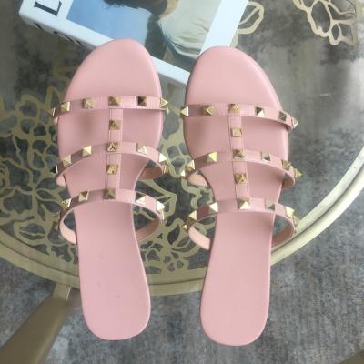 China Durable Hot Selling Silver Rivets Strap Sandals Short Sexy Flat Women Heel Casual Slippers for sale