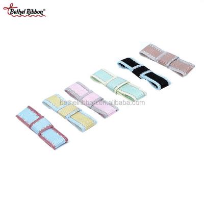 China Luster two color grosgrain ribbon bow with small silver thread bow for underwear for sale