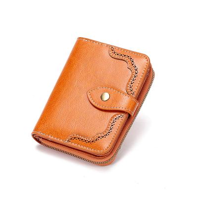 China Fashion Women RFID Blocking Short Design Wallet Genuine Leather Zipper Around Zipper Coin Pocket Clutch Mini Travel Purse for sale