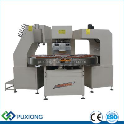 China High frequency welding and lathe cutting machine/stationery/flash/usb card lathe hardware automatic rotary table 3 station hardware blister disc with robot arm for sale