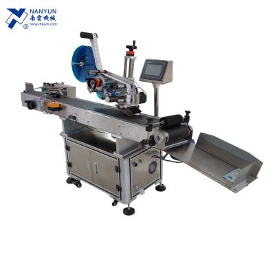 China NanYun CLOTHING NY-817F brand plastic bag labeling machine flat surface card sheet pocket labeler for sale