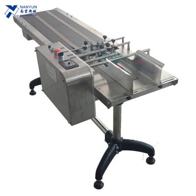 China NY-826 Automatic Food Card Label Stack Pouch Feeder Paper Paging Machine for sale