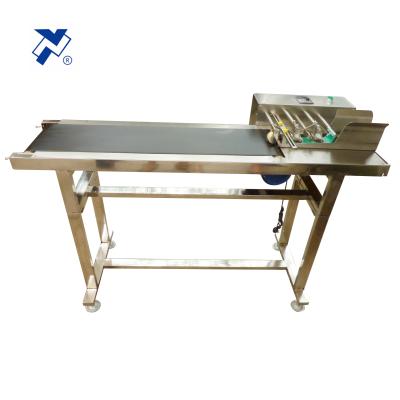 China New Design Paged Machine/Food Page Conveyor For Line Inkjet Printer System for sale