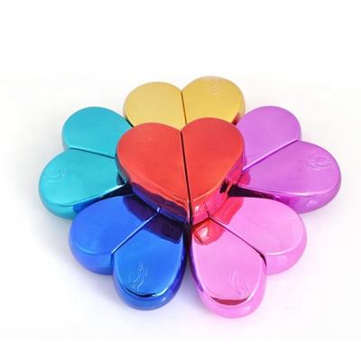 China Heart Shaped Empty Bottle Heart Shaped UV Color Personal Care 25ml Perfume Spray Pocket Bottle With Atomizer for sale