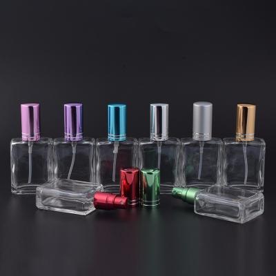 China Personal Care Empty Glass Bottle 17ml Square Spray Refillable Clear Glass PET Bottle Elegant Perfume Bottle for sale