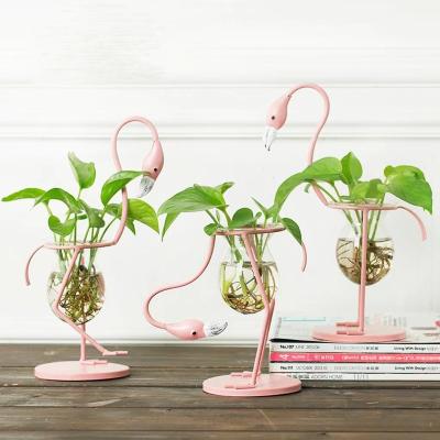 China Contemporary Design Sense Flamingo Wrought Iron Vase Home Decoration Creative Hydroponic Glass Vase for sale