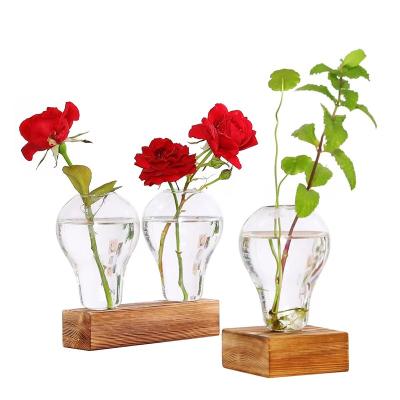 China Custom Wholesale Contemporary Borosilicate Clear Vase Glass Vase Bulb Shape Bulb Decoration Factory Desktop Container With Wood Base for sale