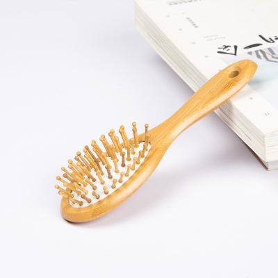 China For Wholesale LOGO Home Use Air Cushion Comb Custom Made Bamboo Mini Massage Wooden Hair Comb Eco-friendly Detangling Massage Comb for sale