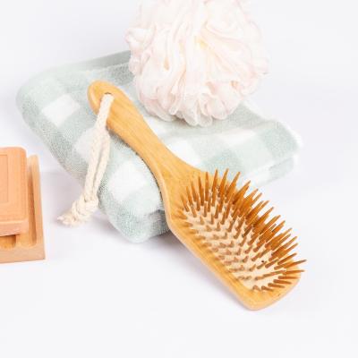 China For Home Use Massage Hair Brush Bamboo Wooden Comb With Silicone Massage Air Cushion for sale