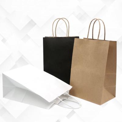 China Recyclable High Quality Shopping Package Custom Logo Printed Kraft Paper Bag With Handle for sale