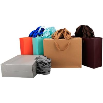 China Latest Biodegradable Factory Cheap Gift Bags Premium White Cardboard Paper With Handles Gift Shopping Paper Bags for sale