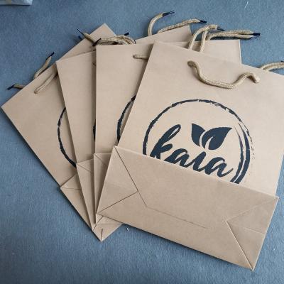 China Customize-design Moisture-Proof Luxury Logo Printed Paper Bag For Gift Shopping Packing for sale