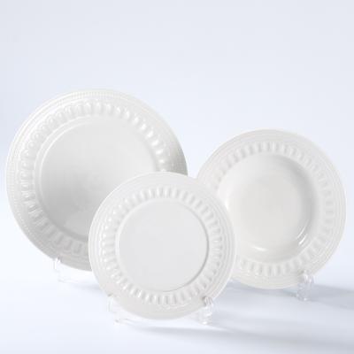 China Sustainable Wholesale 18PCS Embossed White Porcelain Dinnerware Dinnerware Sets Dinner Set for sale