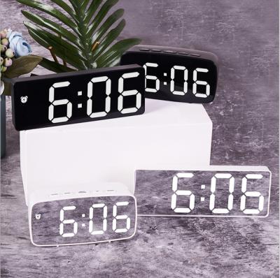 China Creative Simple Multifunctional Clock Battery Calendars Plug-in LED Dual-Use Clock for sale