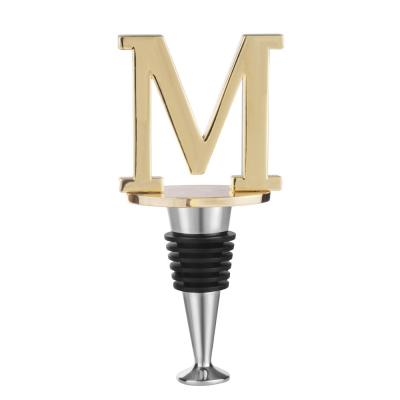 China Viable Letter M Wine and Beverage Bottle Cap with Gold Finish for sale