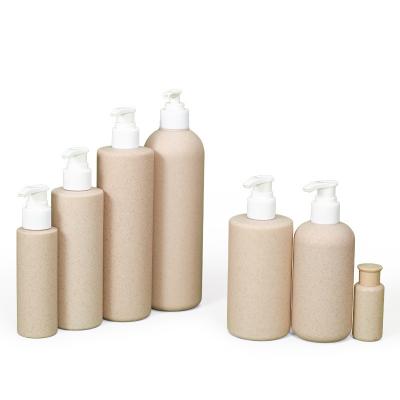 China Biodegradable Wheat Straw Plastic Hotel Shampoo Bottles With Pump Dispenser 300ml for sale