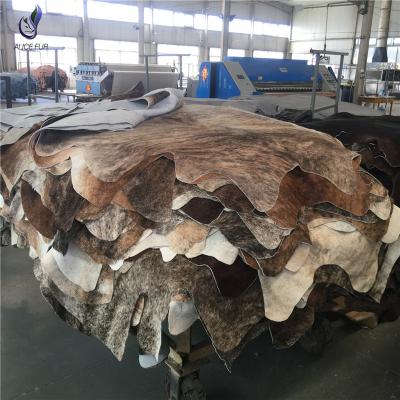 China Wholesale Organic Cowhide Blanket Supply Organic Phosphor Tanned Hair On Natural Cowhide Cowhide Large Cow Hide for sale