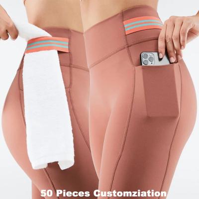 China 2021 High Waist Yoga Pants Gaiters Gym Wear Butt Lifting Compression Pocket Antibacterial Wholesale Womens Designer Leggings for sale