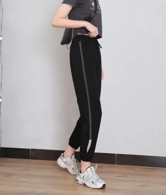 China Anti-wrinkle summer ice silk quick-drying women's ninth casual pants for sale