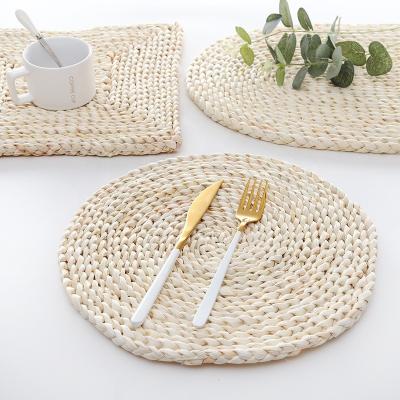 China Natural Handmade Corn Husk Water Hyacinth Woven Round Place Mats And Coasters for sale