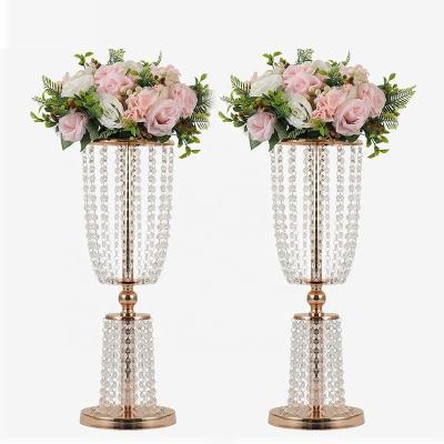 China 2023 hot sale gold flower stand pearl curtain gold iron stand wedding table romantic wedding table centerpiece luxury crystal centerpiece decoration for sale