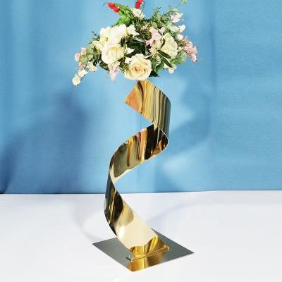 China 2023 Vintage Hot Selling Gold Metal Stainless Steel Centerpiece Dining Table Creative Rotating Modern Wedding Flower Stand for sale