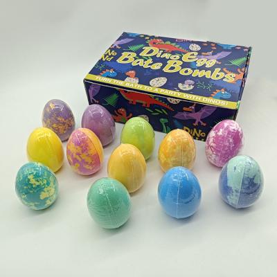 China Colorful SPA/home/travel/bath/feet dinosaur egg bath bomb 150g*12PCS bath bomb gift set fizzies with toys kids bubble bath bomb for sale