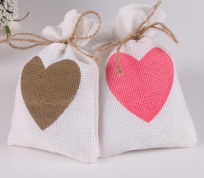 China Wine Sack/Burlap Gift Drawstring Bag BSCI Certified Factory Love Heart Canvas Bags Drawstring Jute Sack For Kids Present Gift for sale