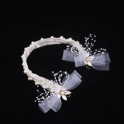 China Handmade Bridal Tiara Bow Wedding Bridal Crystal Pearl Headband Diamond Headband with Flowers and Pearl Wedding Headband for sale