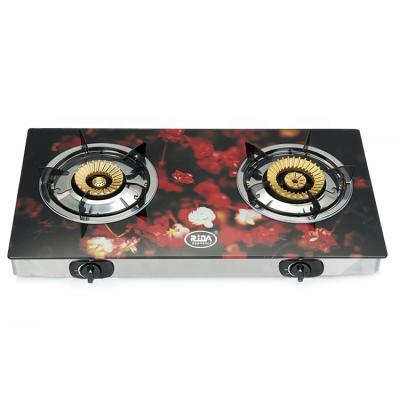 China Hotel Kitchen Appliances Induction 2 Burner New Design Printing Gas Stove Glass Top Cooker for sale