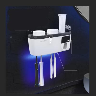 China UV Sustainable Toothbrush Holder and Automatic Toothpaste Dispenser Toothbrush Holder for sale