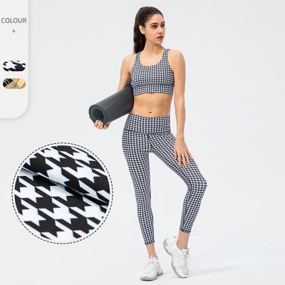 China Wholesale Breathable High Quality 2022 Ladies Yoga Clothes Sportswear Workout Sports Gym Customized 2 Piece Sports Bra And Shorts Yoga Set for sale