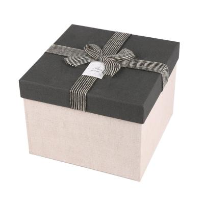 China Handmade Custom Gift Hat Canvas Textured Paper Box With Canvas Bow for sale