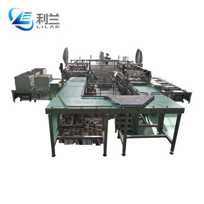 China Automatic CLOTHING Boxes Loading And Unloading Machine For Retort Basket for sale