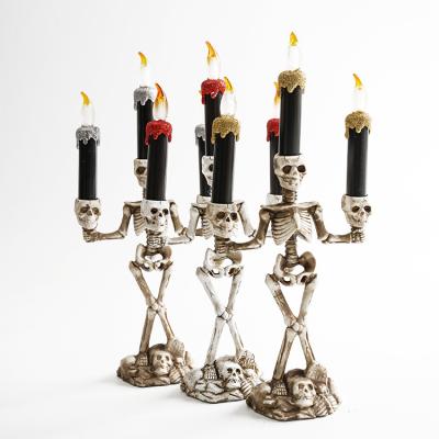 China Wholesale Resin Antique Skeleton Shaped Unique Decorative Candle Holder Home Office Candle Holders for sale