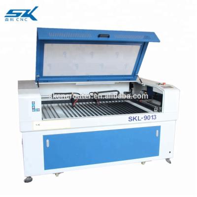 China Laser Cutter Double Heads CNC Acrylic CO2 Wood Laser Cutting Engraving Machine SKL-1390 100W 130W CO2 Laser for sale