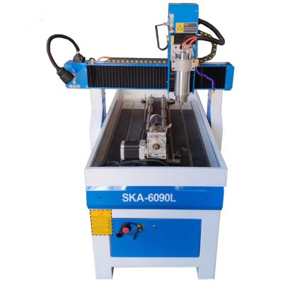 China Advertising Company Advertising Rotary Spindle CNC Router 6090 CNC Router For Iron, Aluminum, Cooper Etc Metal Works. for sale