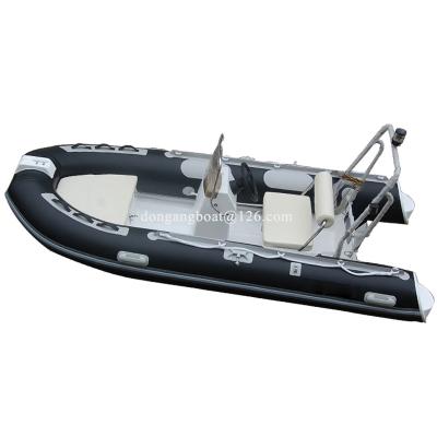 China Family Entertainment/Fishing Rigid Inflatable Boat Wholesale Small Fishing Boats Cheap Fiberglass Inflatable Boats With Outboard Engine for sale