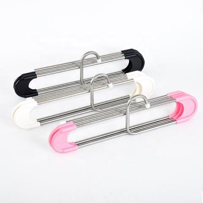 China Folding stainless steel kids portable clothes hanger travel hanger plastic lipat pull out pants hanger set for ties for sale