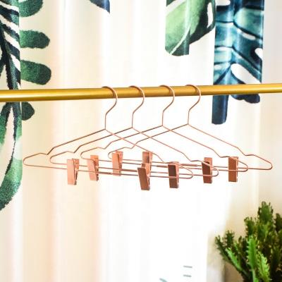 China DISPLAY Metal Hanger With 2 Pinch Clips Non Slip Gold Rose Clothes Hanger For Drying Clothes for sale