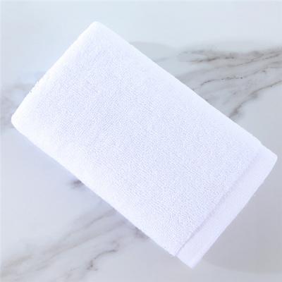 China Compressed 100% Solid Color Cotton Face Towels Bath Hotel Towels for sale