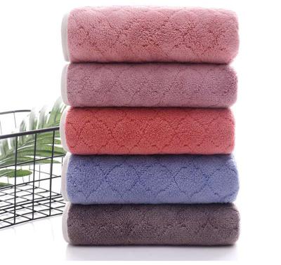 China Sustainably Soft Coral Velvet Absorbent Binding Face Towel Dry Hair Towel for sale