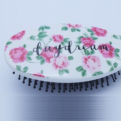 China OBH-0006 Oval thermal cushion heat transfer printed plastic detangling hair brush for sale