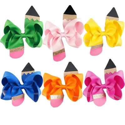 China Fashion 4 inch pencil design grosgrain ribbon hair accessories back to school hair bows for kids girls for sale