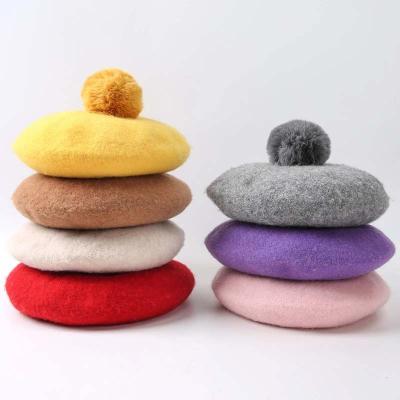 China Soft Touch Feeling Kids Pompoms Beret Hat Solid Color Girls Winter Wool Octagonal Painter Beret Hats For 1-3 Years Old Kids for sale