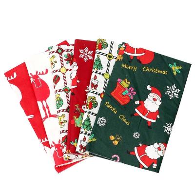 China Fashion Anti-UV Christmas Printed Santa Sheets 100% Cotton Fabric Making Bags Dresses For Home Textile Decorate for sale