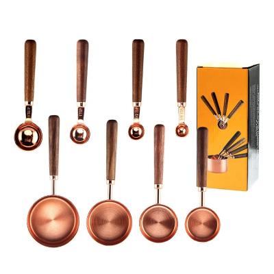 China Sustainable Hot Selling Stainless Steel-Copper Rose Gold Measuring Cups And Spoons Set With Walnut Wood Handle for sale