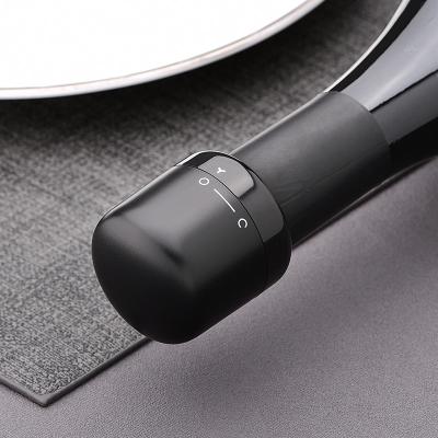 China Viable Wholesale Black Vacuum ABS Mini Wine Bottle Stoppers Reusable With Bubble Sealer Lock for sale