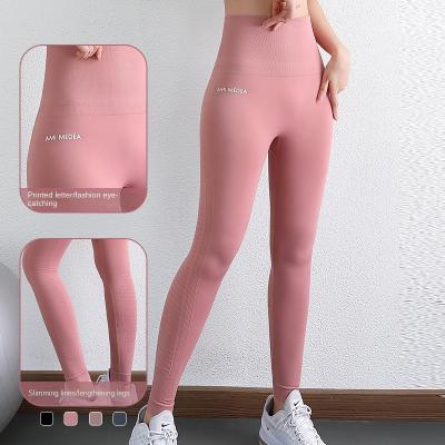 China Breathable popular women's stretch hip lift yoga pants high-waist quick-drying tight yoga pants for workout for sale